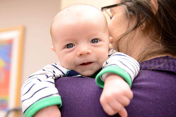 Nurse caring for baby.
