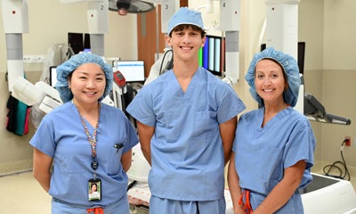 Dr. Carmen Tong, John Evans and Mary Evans