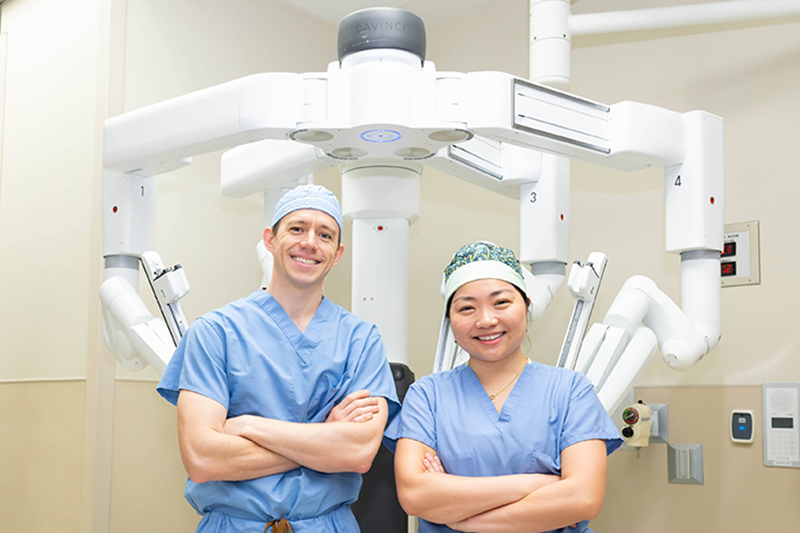 Dr. Carmen Tong and Dr. Tim Boswell, Children’s of Alabama urology team, Da Vinci surgical robot