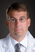 Dr. Mark Law